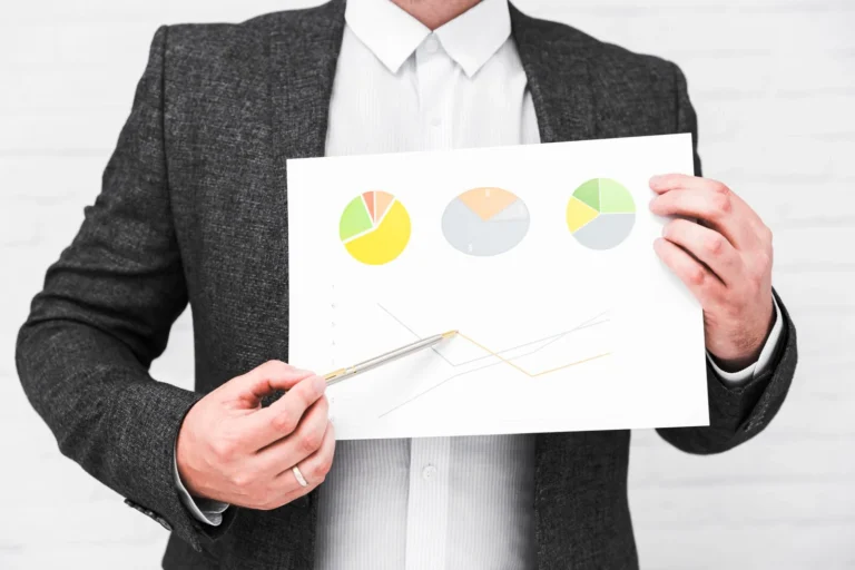 business-people-showing-charts-statistics_23-2148194722
