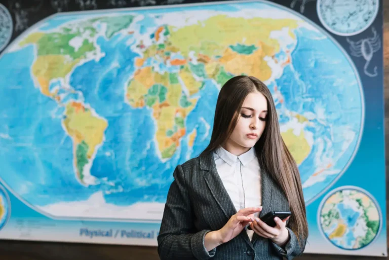 business-woman-using-smartphone-office_23-2148071549
