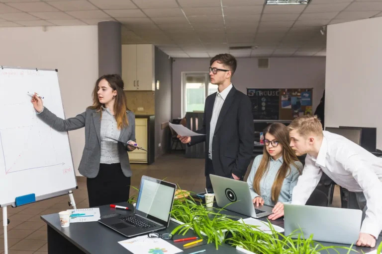 group-businesspeople-working-together-workplace_23-2147838543