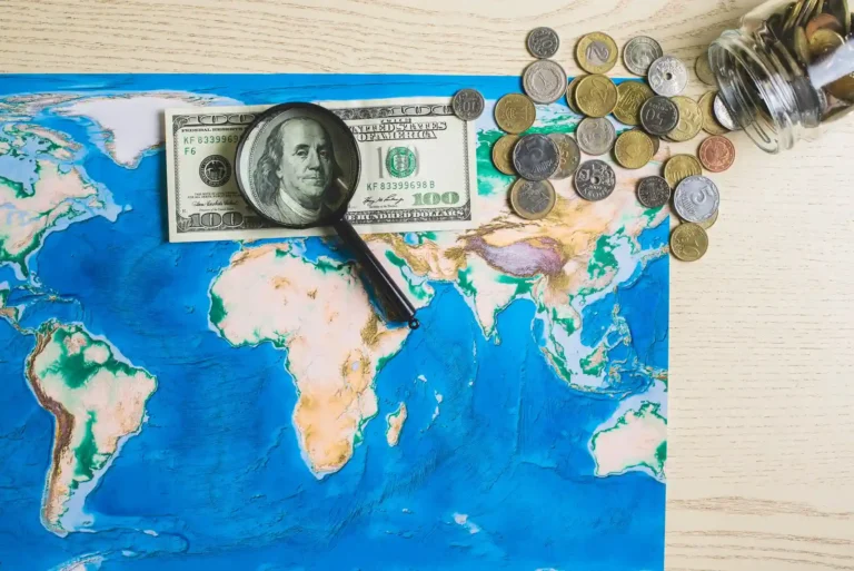 map-world-with-money-magnifying-glass_23-2147604728