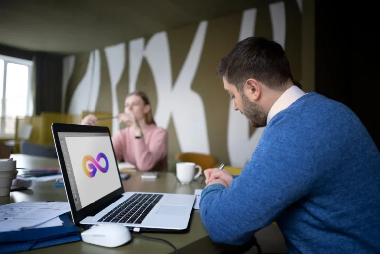 medium-shot-people-working-with-laptop_23-2149345218