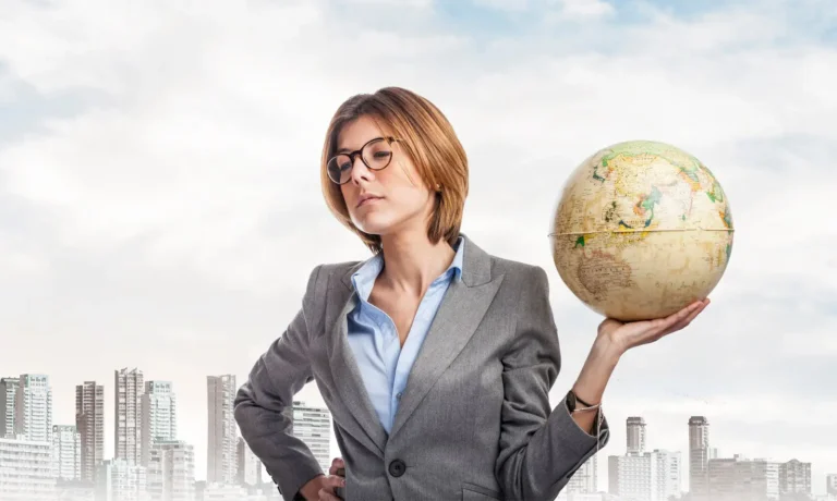 serious-employee-holding-globe_1149-122