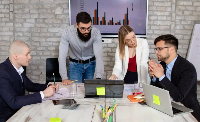 successful-business-partners-having-meeting-discussing-new-business-project-ideas-office_181624-47726